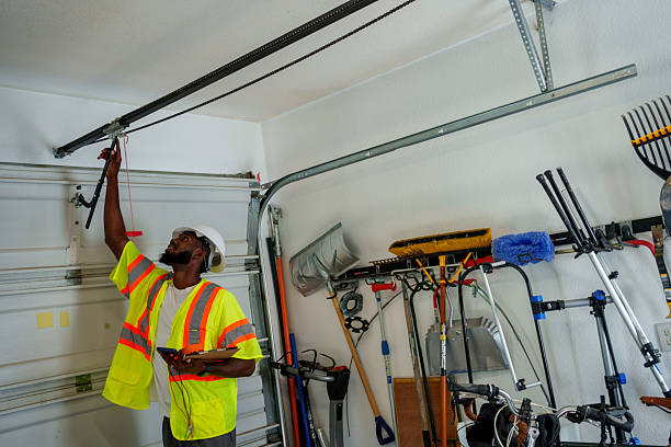 Professional Garage Door Panel Replacement technician working in Des Moines, IA